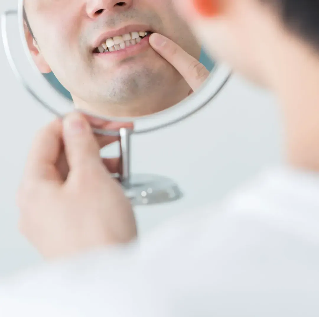 man holding a mirror